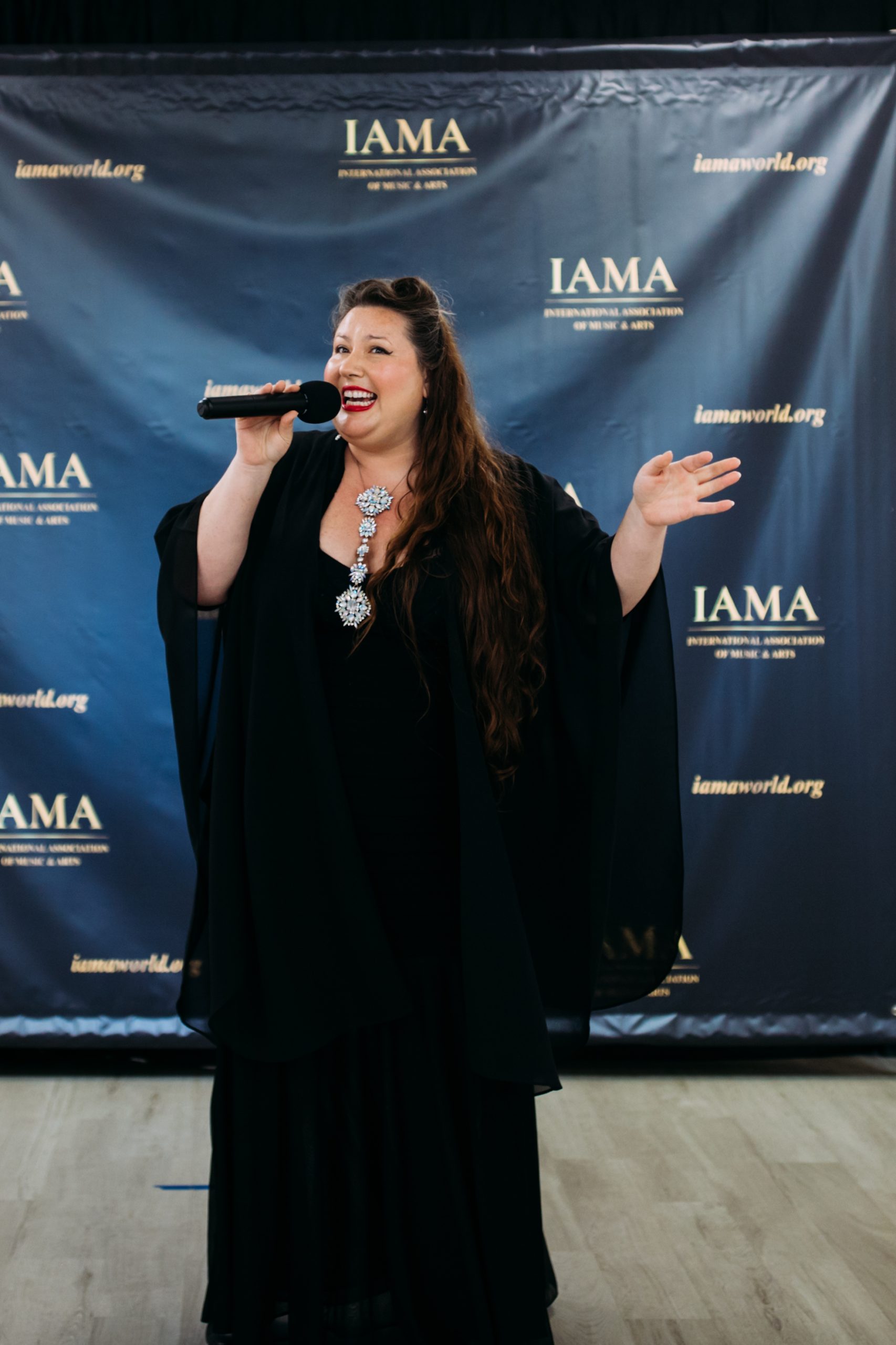 Singer sharing an expressive performance at the festival