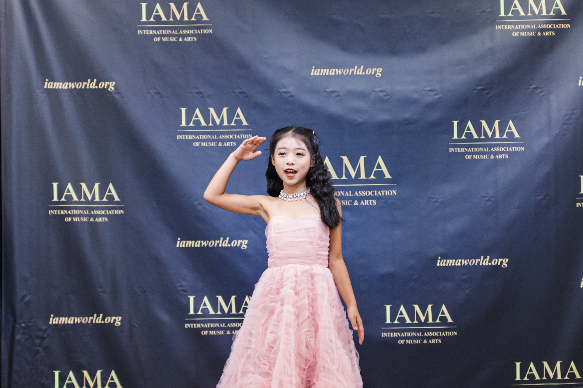 Young singer performing at the Texas Vocal Arts Festival