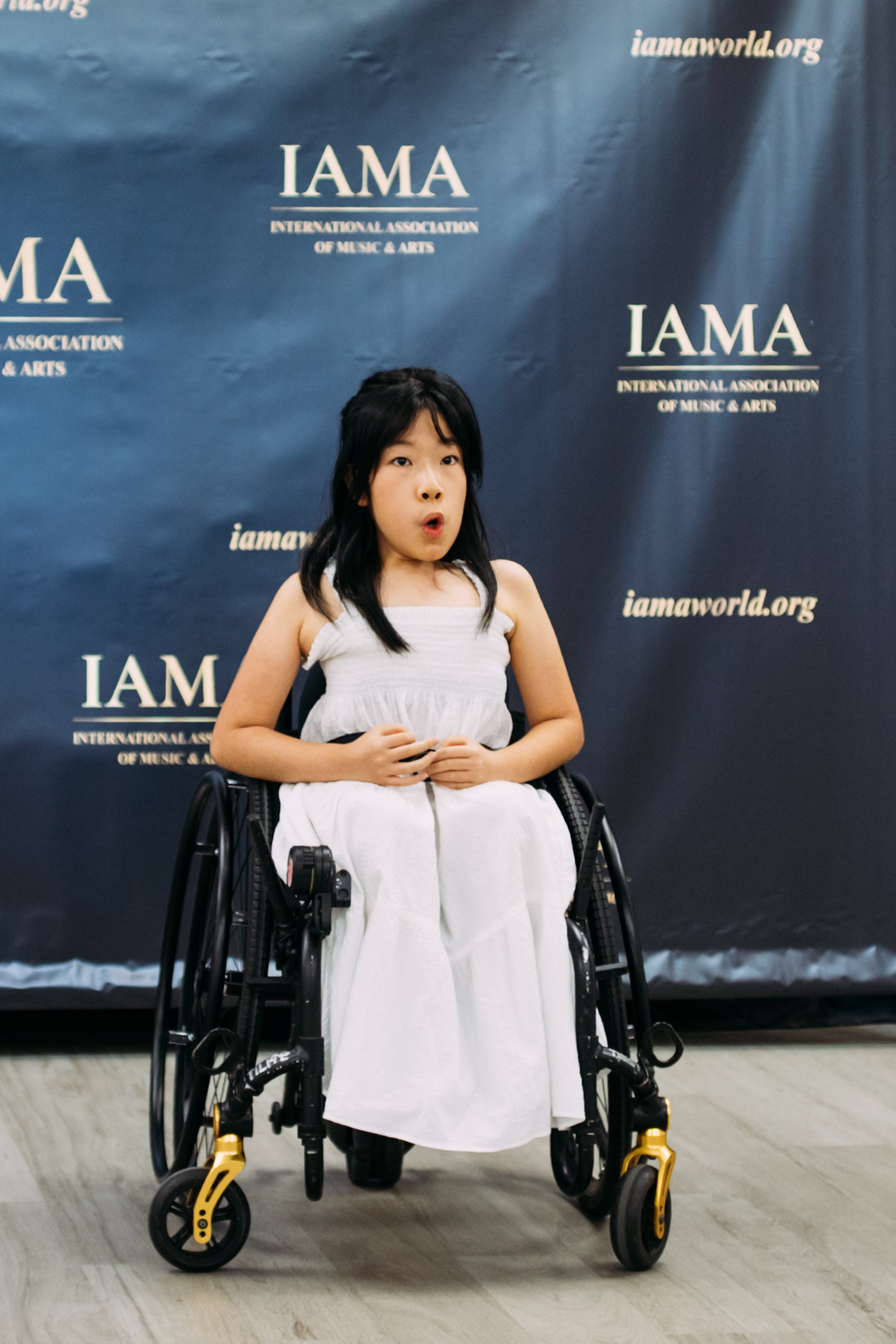 Singer performing with confidence at the IAMA festival