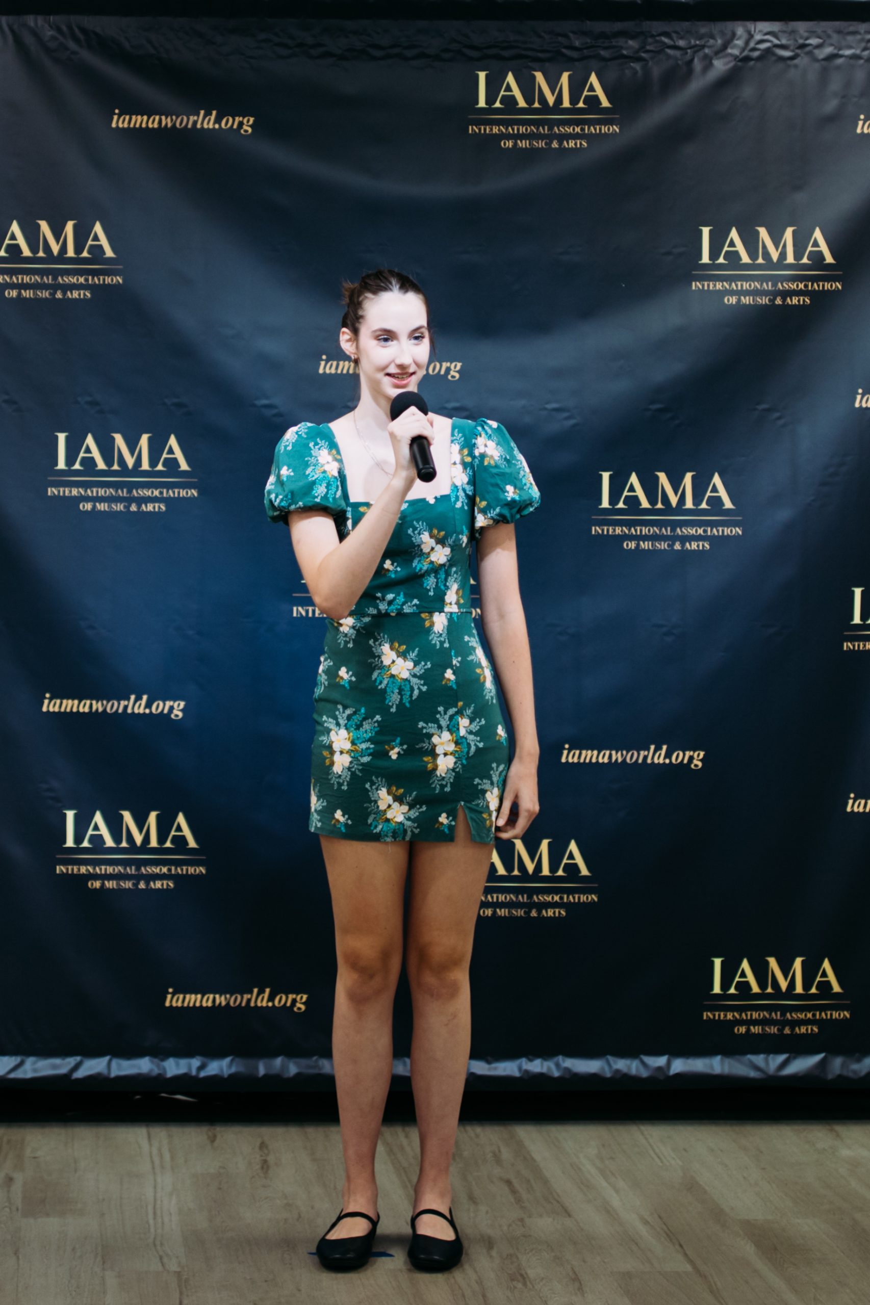 Competition participant singing in Plano Texas
